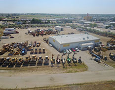 front of prestige, arieal view of road and property