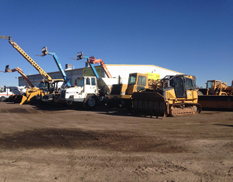 CAT (back)loaders line up